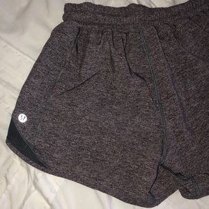 Lulu lemon grey outline in hunter green shorts